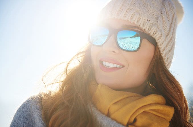 woman wearing sunglasses in the winter