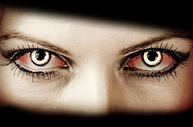 person wearing Halloween contact lenses