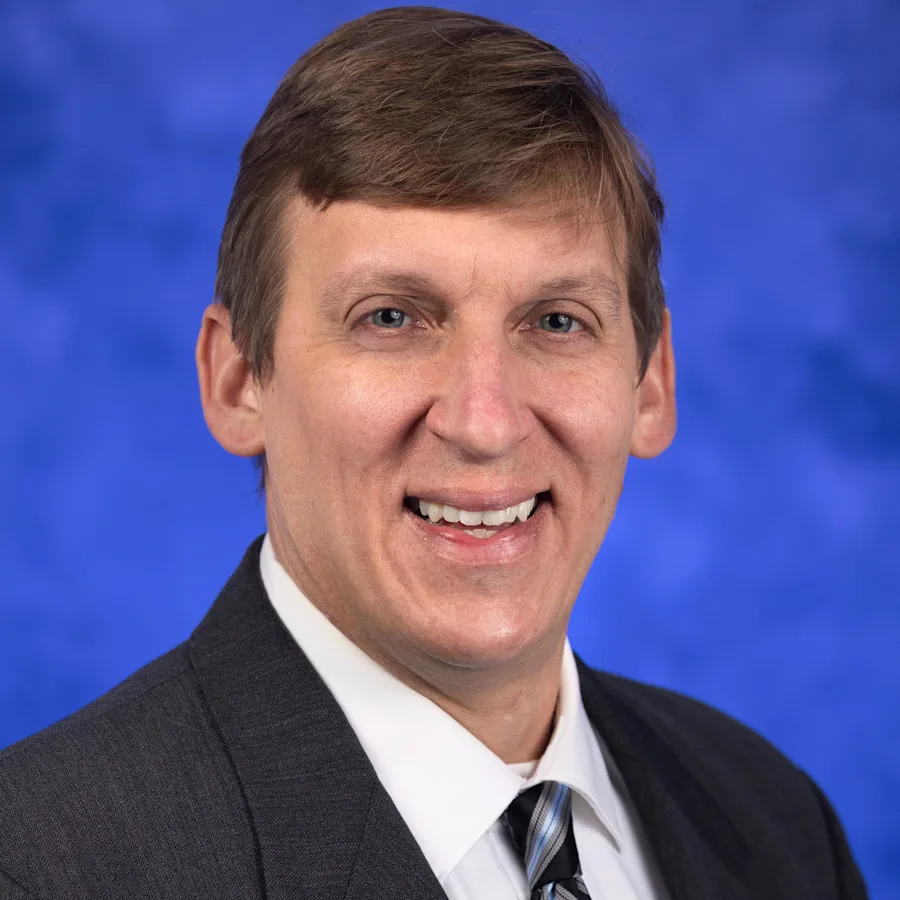 A professional photo of Joshua Cysyk
