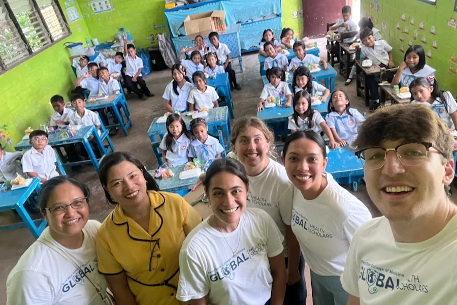 Global Health Students pictured at elementary school during a Global Health trip to the Philippines.