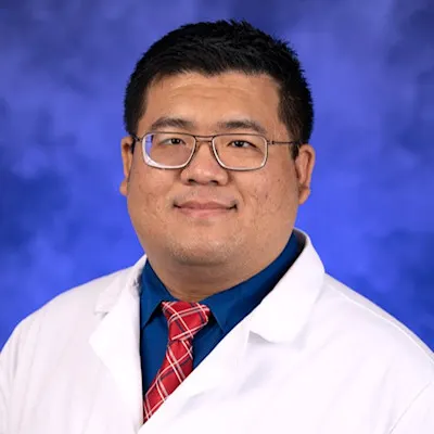 A Professional Portrait of Xiaoyu Wang