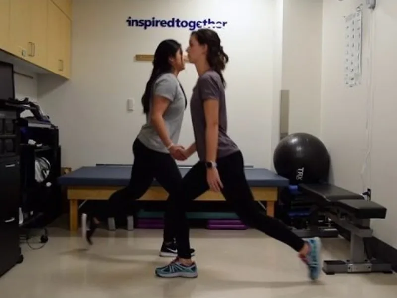 Two people do lunges