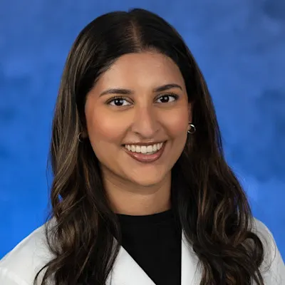 A professional portrait of Avani Vasireddy