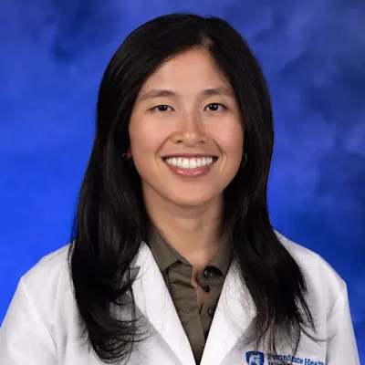 A professional portrait of Flora Yan