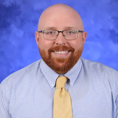 A Professional Portrait of Kenneth Houser