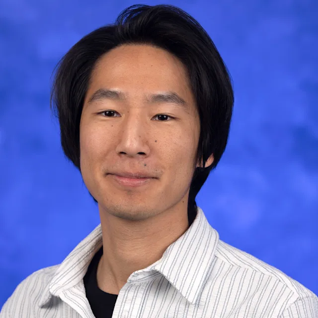 A professional photo of Christopher Chen