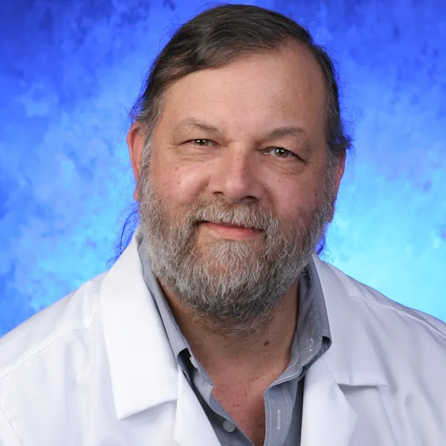 A professional photo of John Ellis
