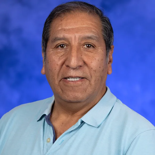 A professional photo of Cesar Aliaga