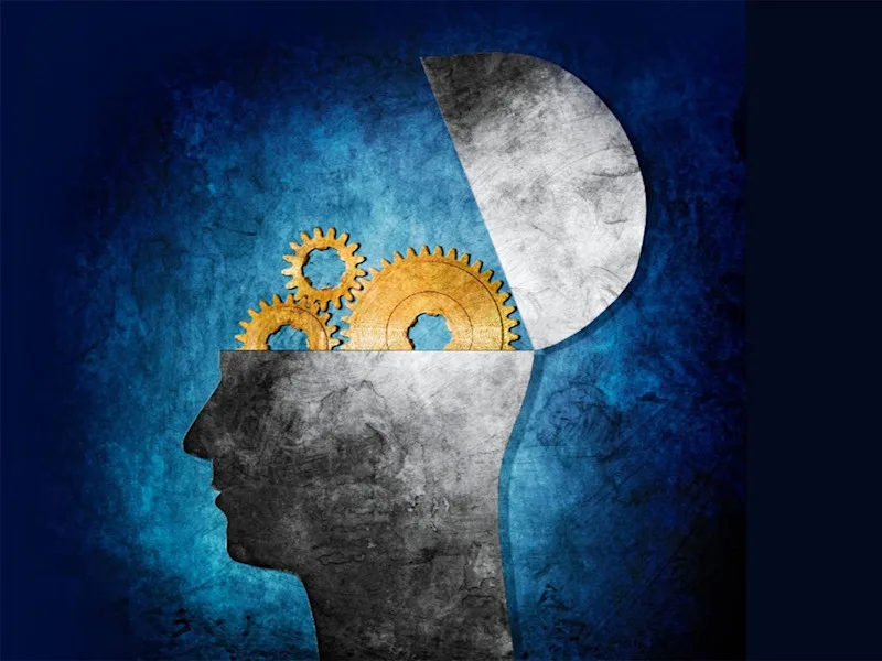 Illustration showing gears coming out of a head