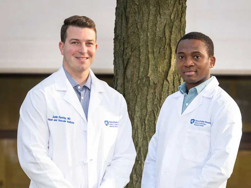 Fellows in the Clinical Cardiac Electrophysiology program pose in the courtyard