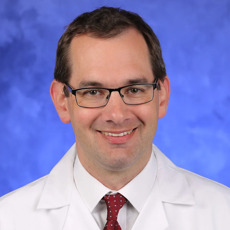 A professional photo of Charles Evans