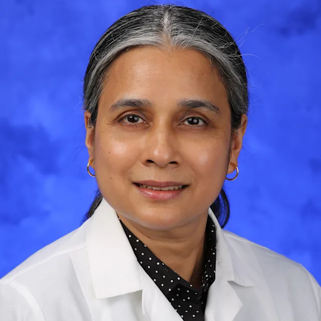 A professional photo of Samina Alam
