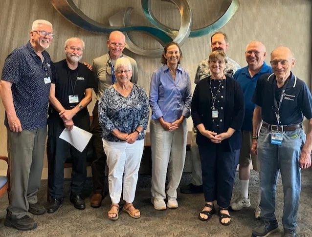 A group of nine emeritus faculty organization members