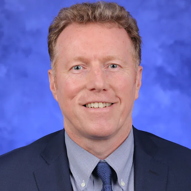 A professional photo of Jonathan Foulds