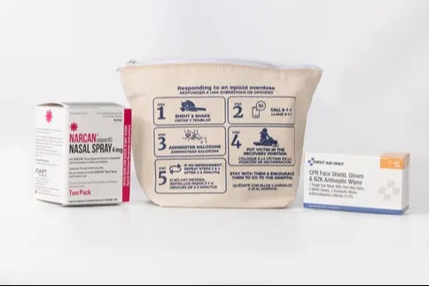 Assorted items in a nasal naxolone kit