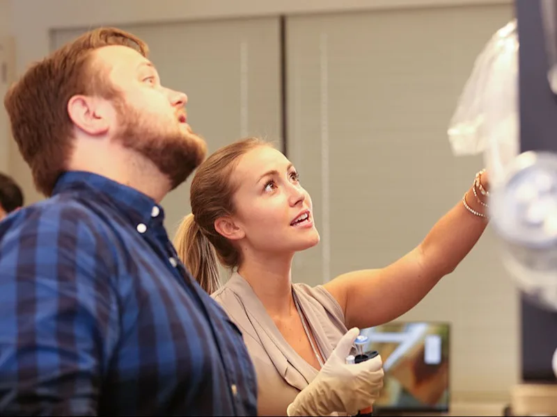 Graduate students at work in a lab