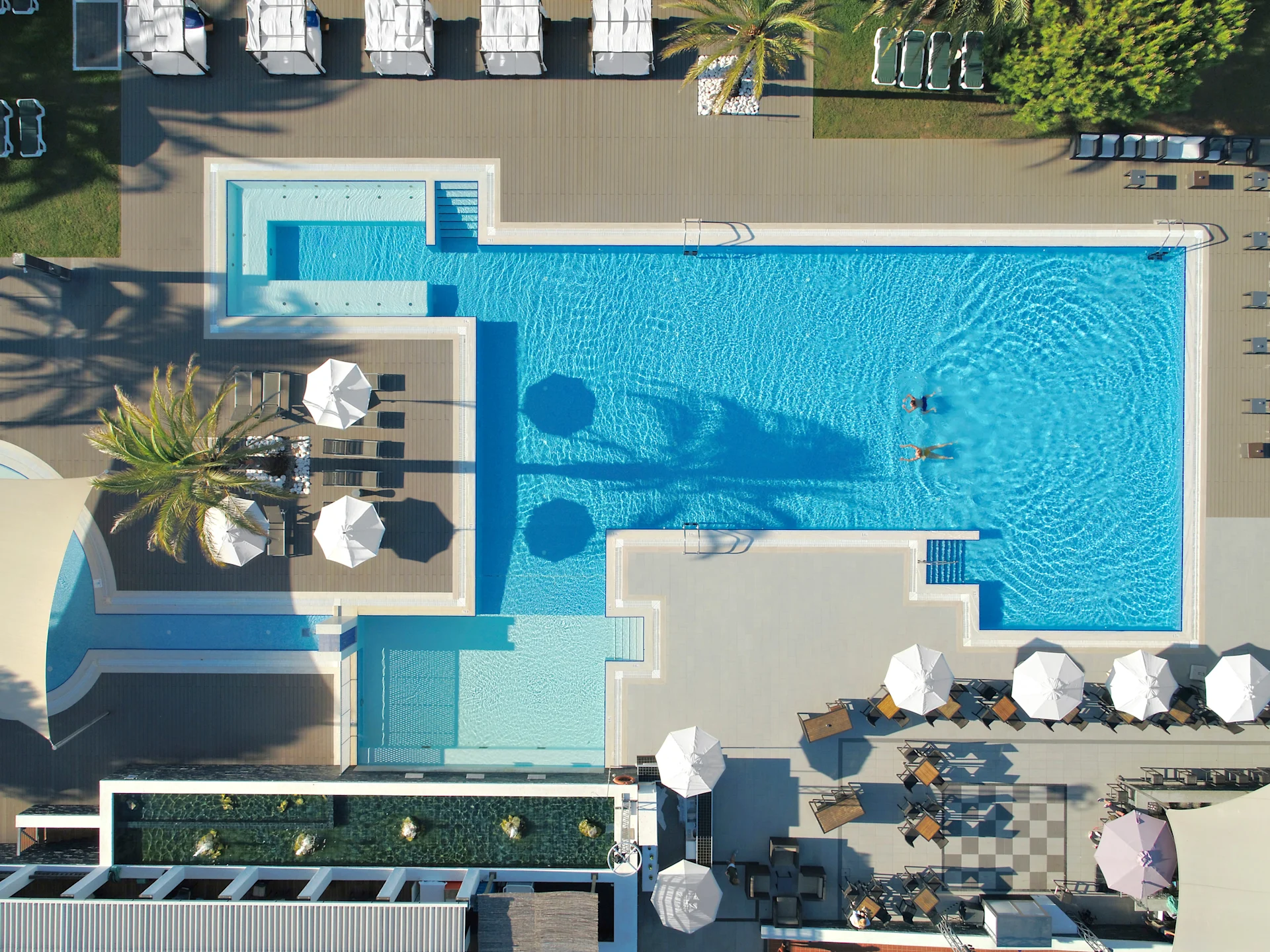 aerial view of pool with 2 swimmers at ROBINSON QUINTA DA RIA
