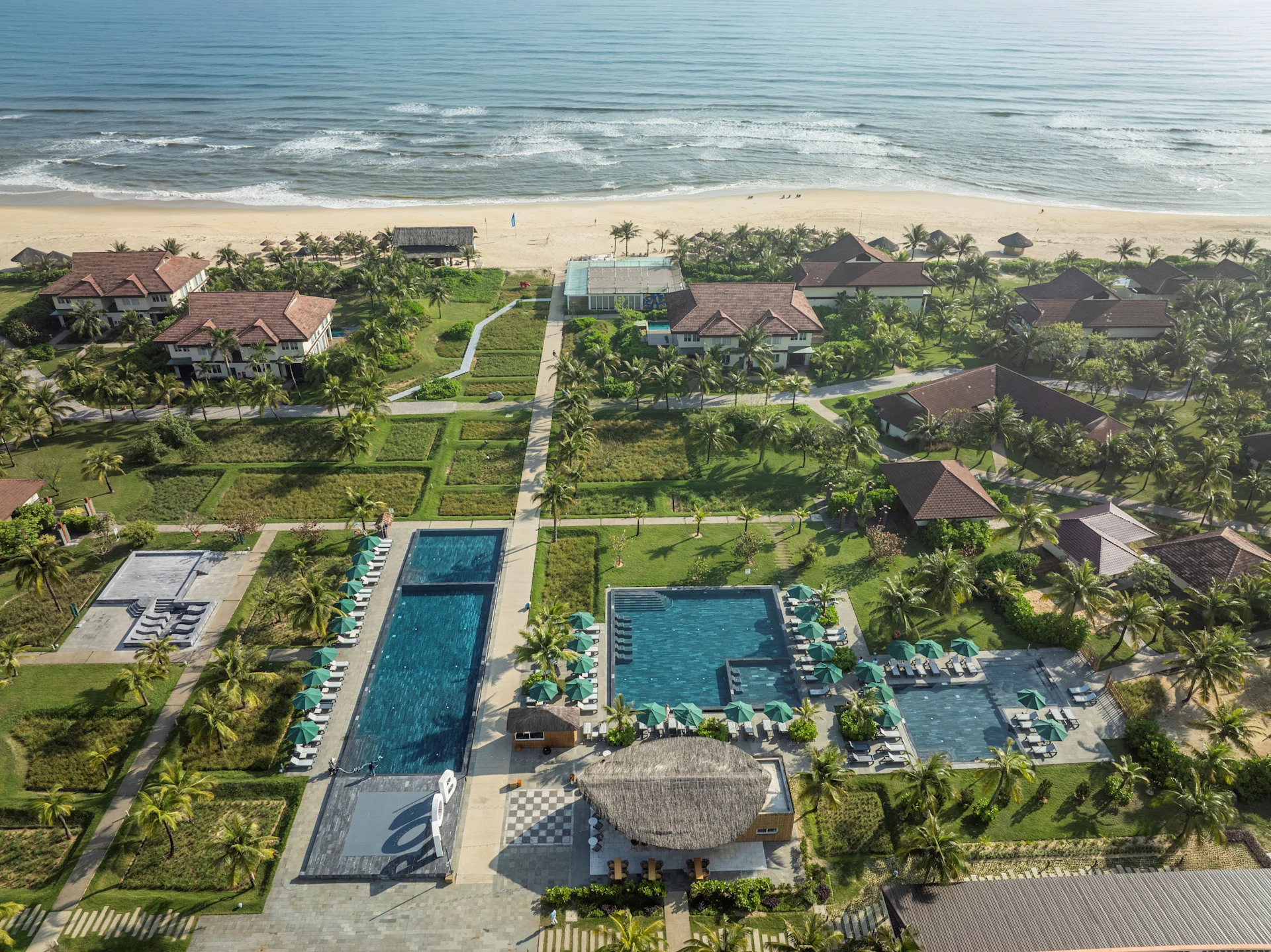 Drone shot of Robinson Nam Hoi An with view of the club, beach and ocean