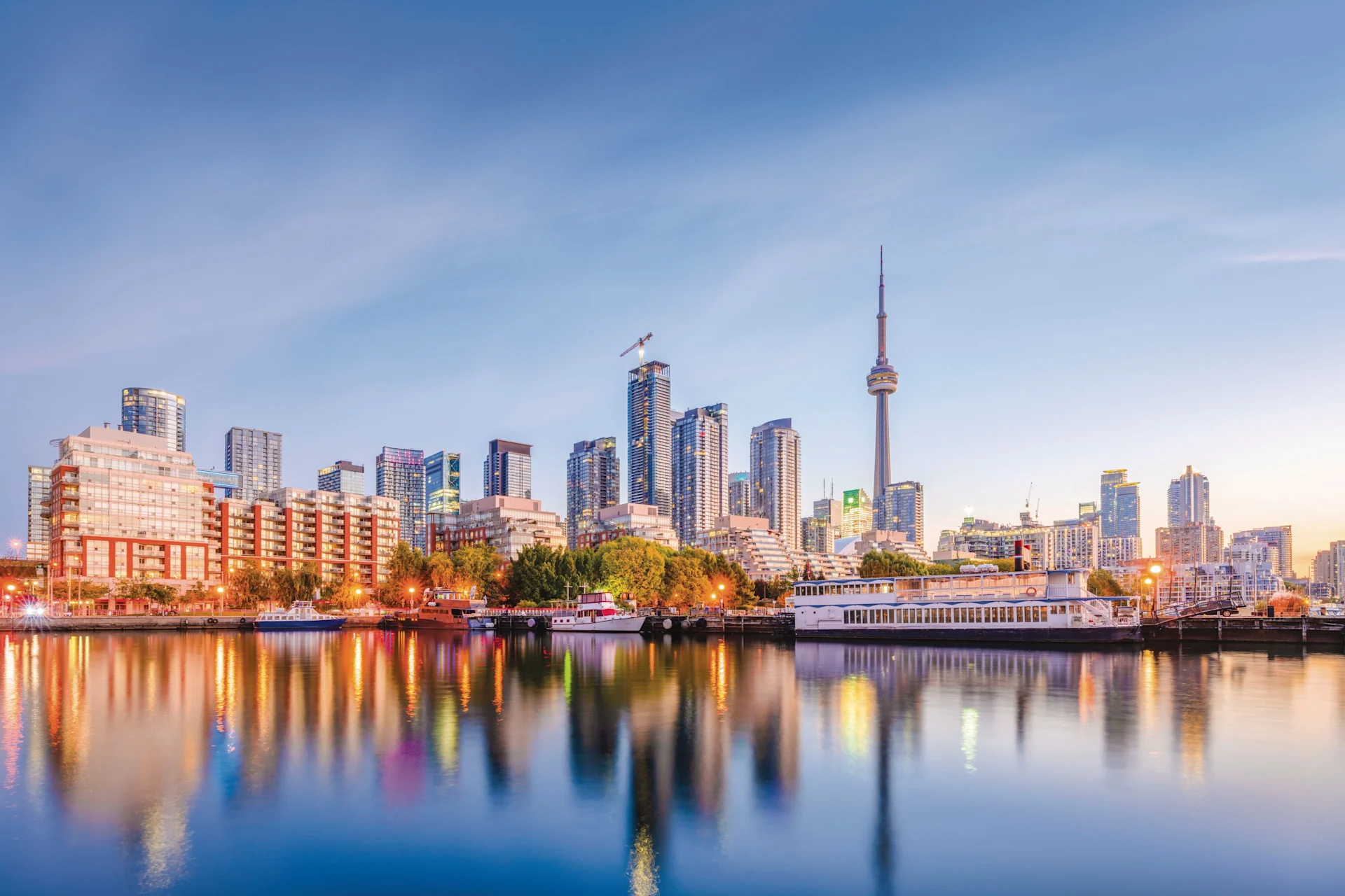 Toronto, Canada, downtown city skyline on Lake Ontario at twilight