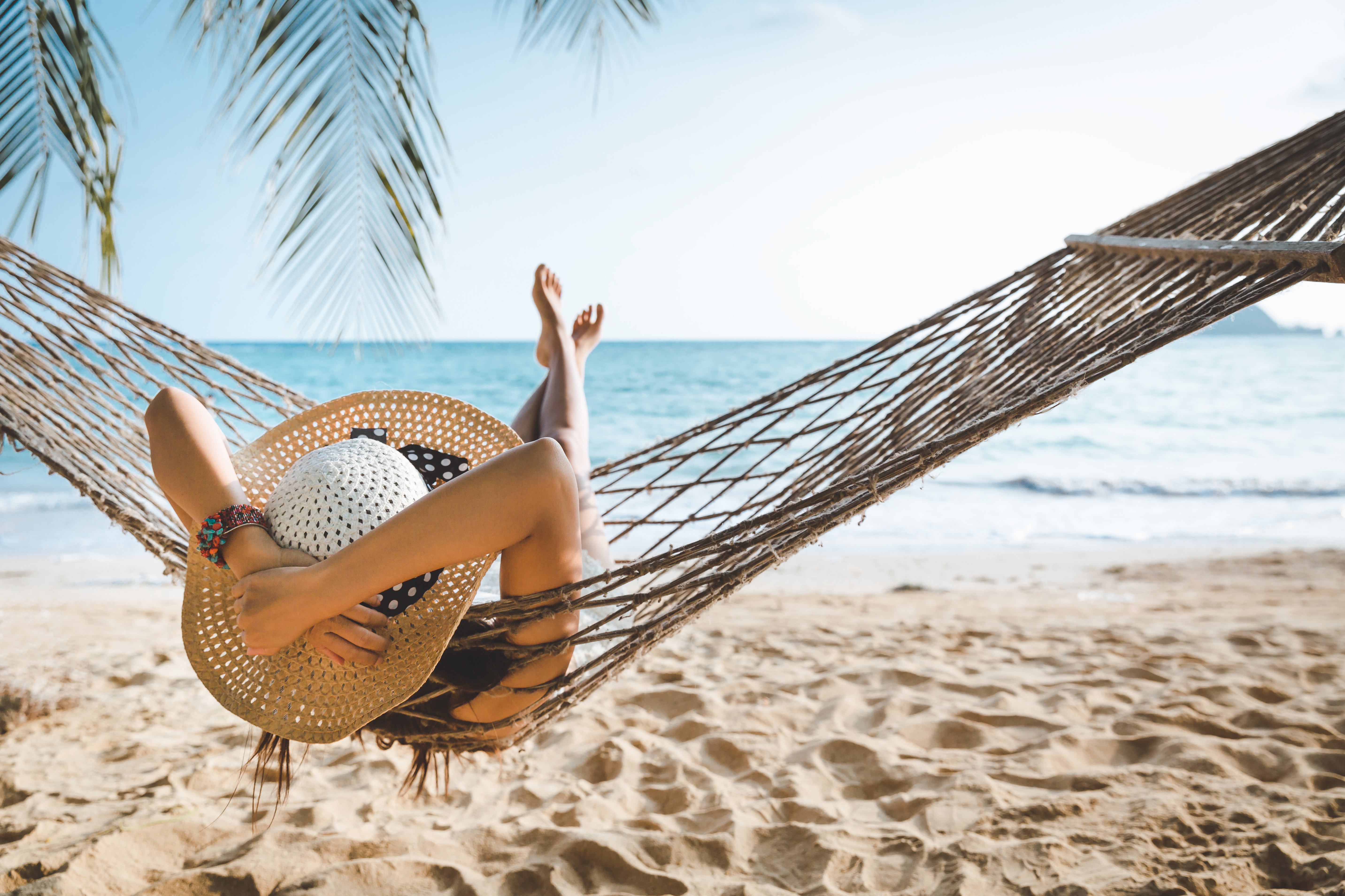 woman-on-hammock-at-beach