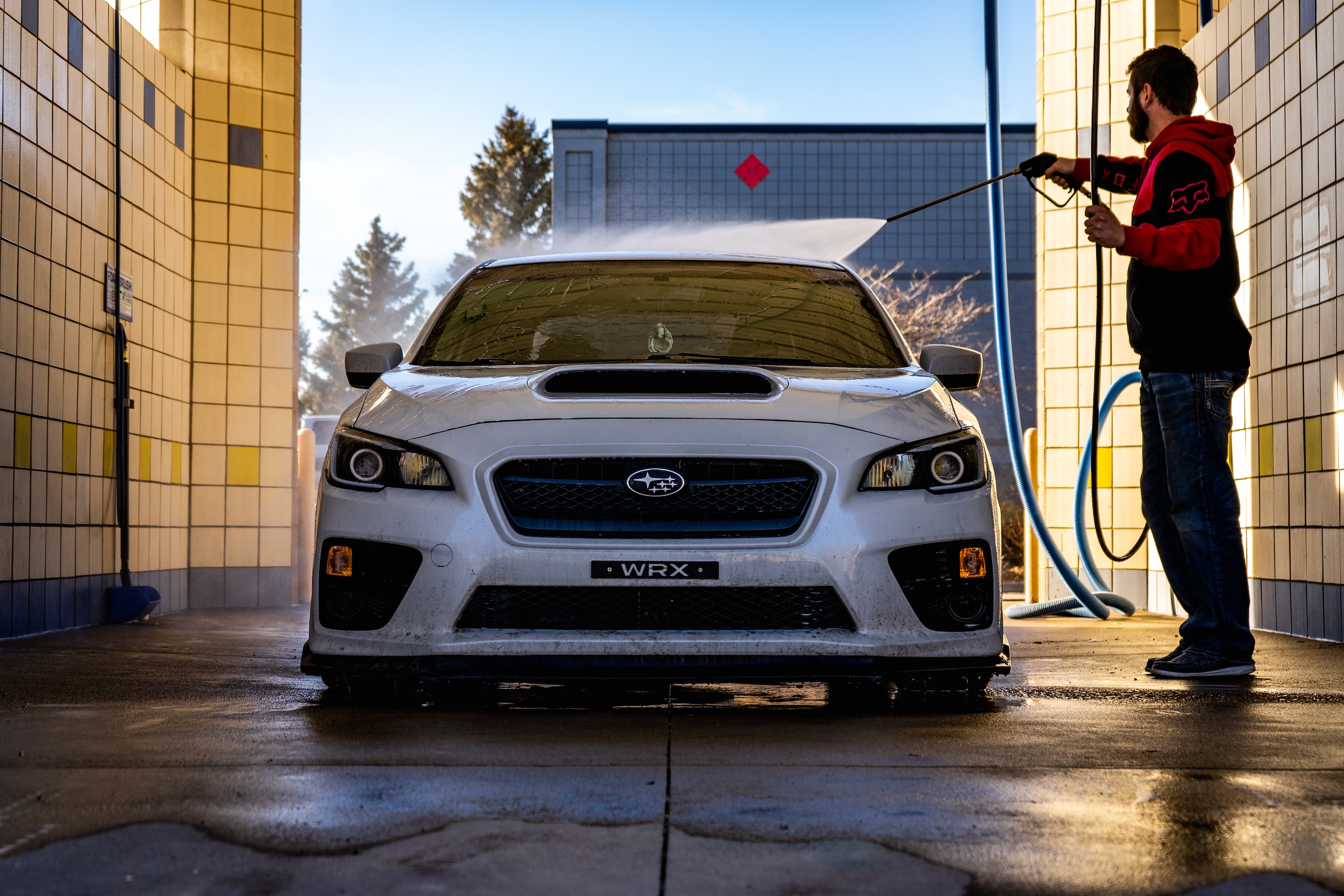 man-washing-car