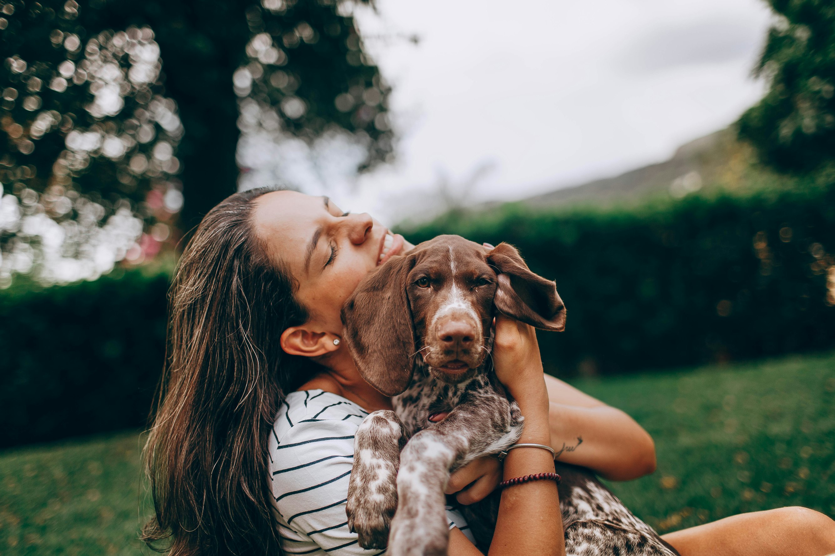 woman-holding-dog