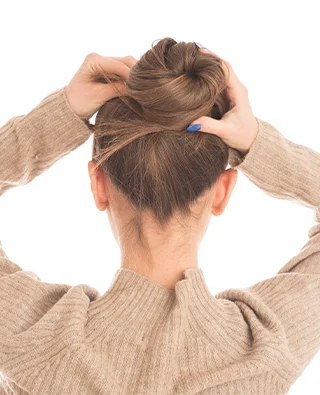 messy hair bun from back