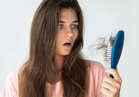 Best Ways To Reduce Excessive Hair Fall At Home Banner Image