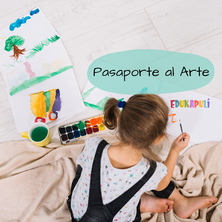 niña de espaldas pintando en el suelo con acuarelas