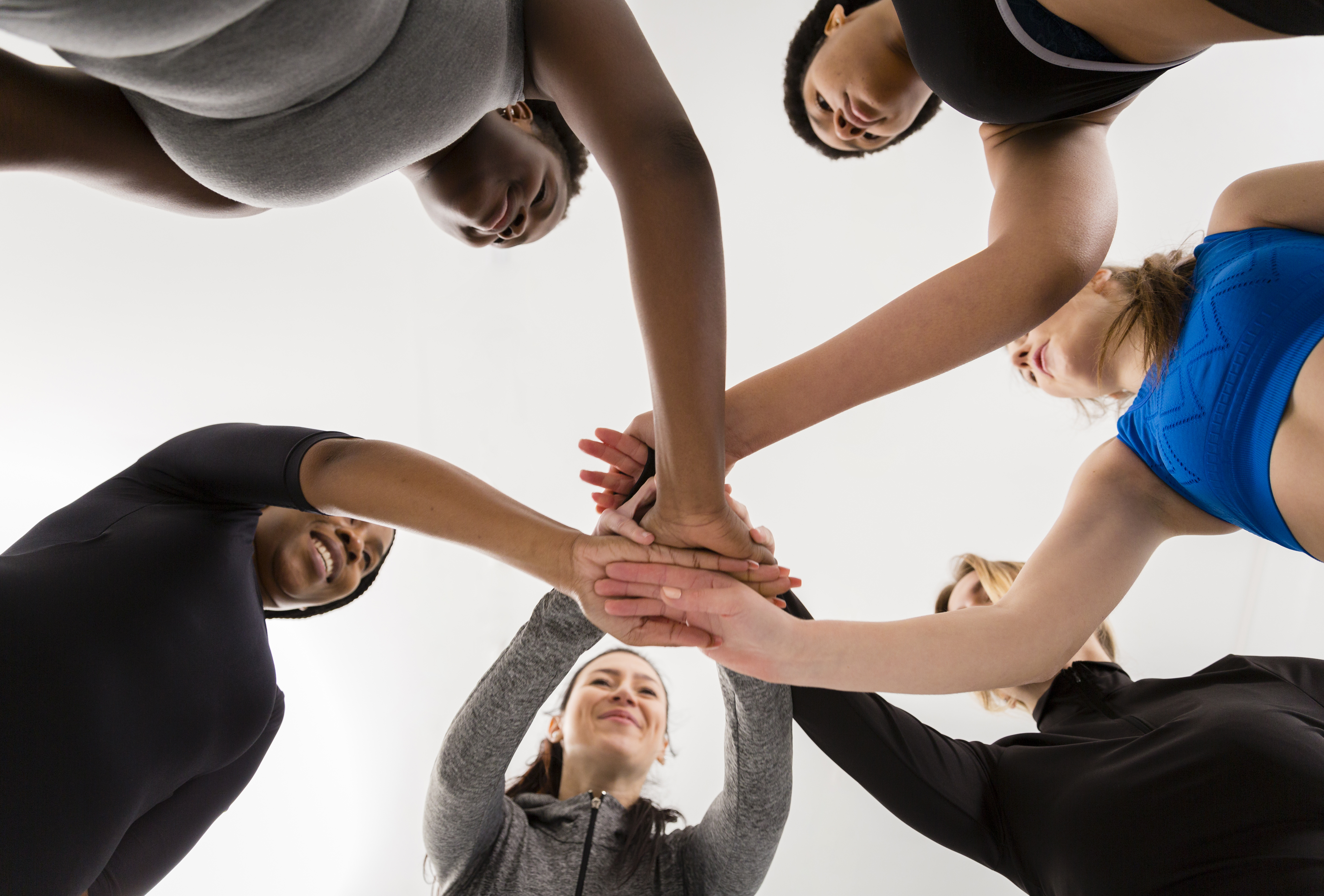 women-fitness-class-shaking-hands