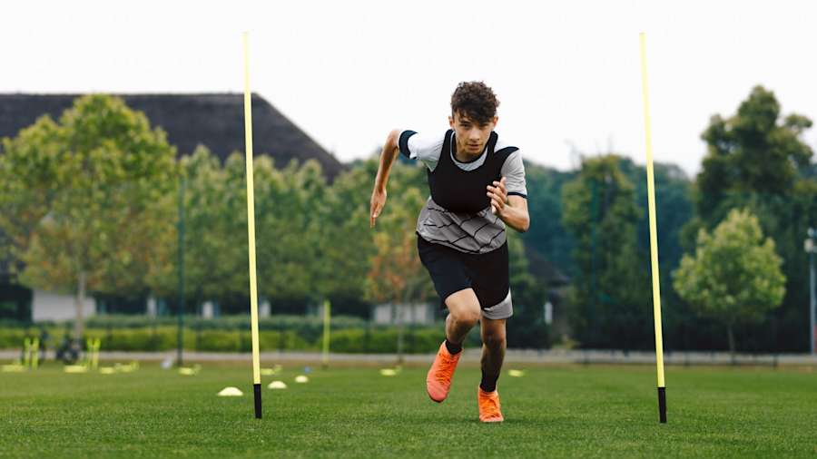 Grassroots football players performing stamina test