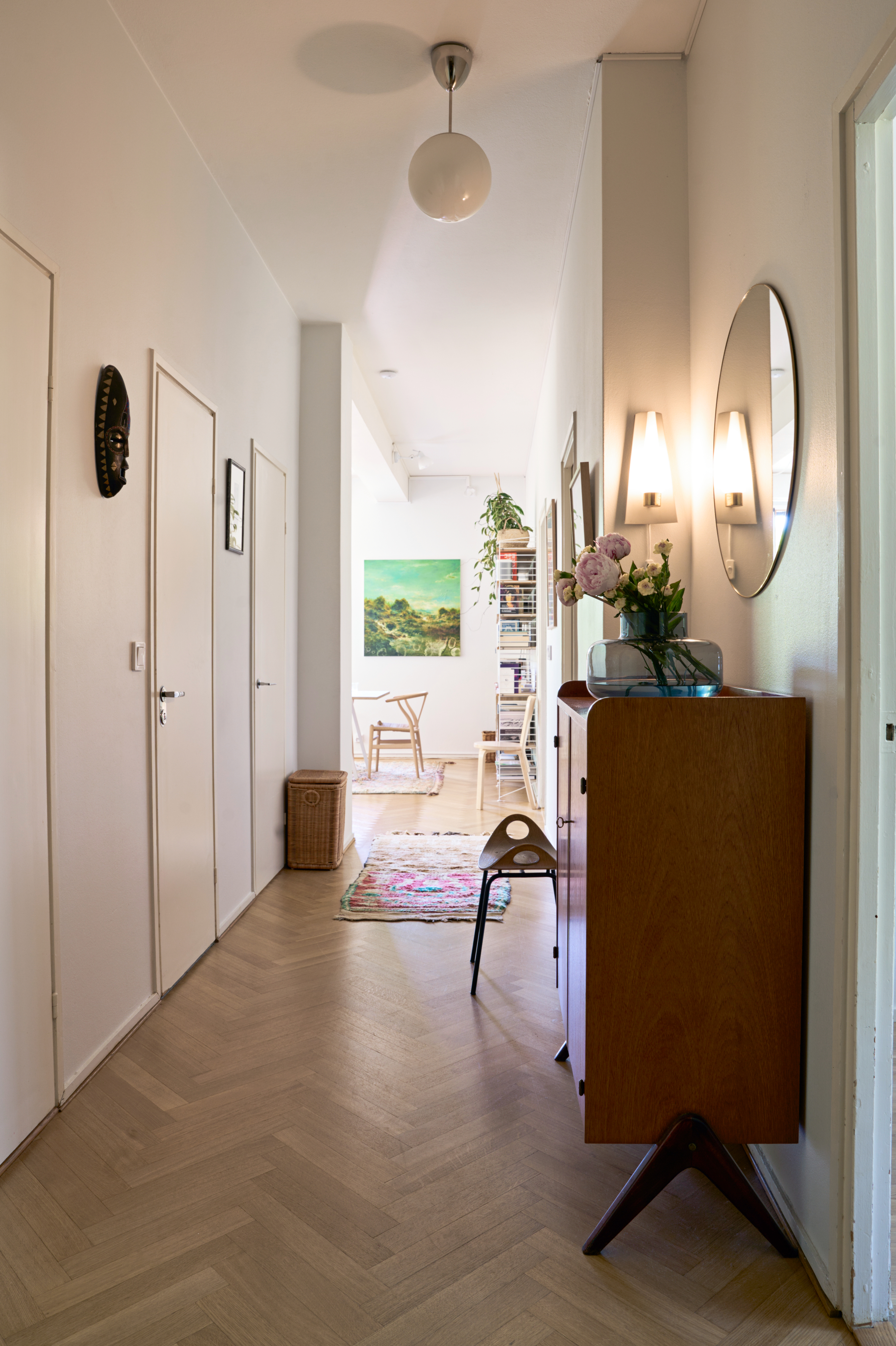 Photo of the hallway with a linen cabinet.