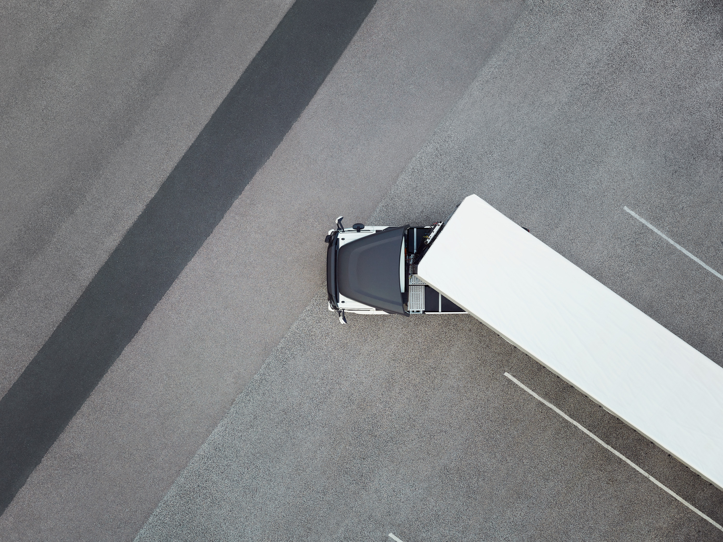 An overhead shot of a truck turning.