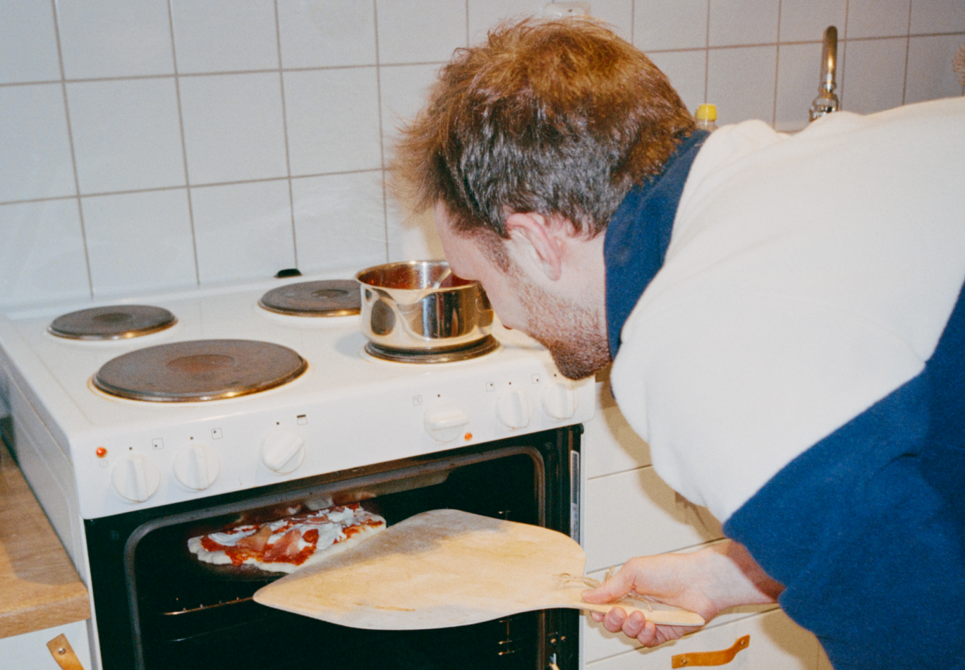 Craig Roberts making pizza