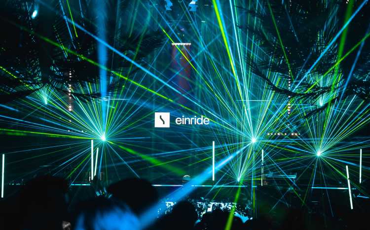 Einride logo on stage with strobe lights
