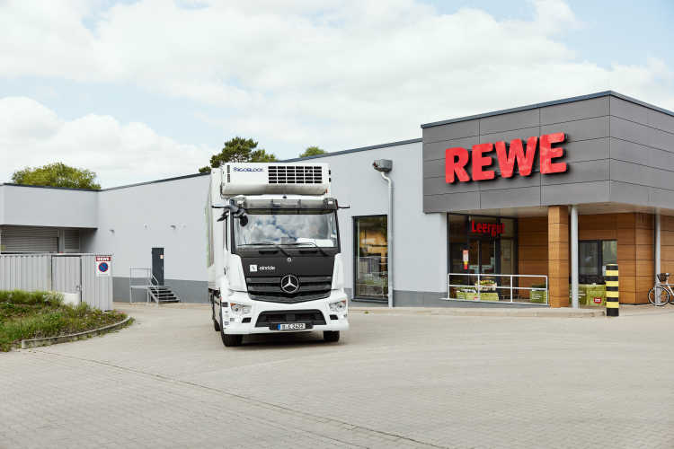 An Einride truck outside a REWE store