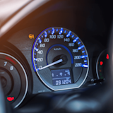 car's odometer with low mileage