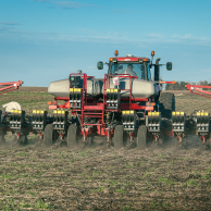 Rear shot of Case IH tractor planting with SIMPAS equipment