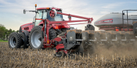 Side shot of Case IH tractor planting with SIMPAS equipment