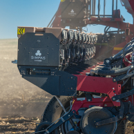 Side view of SIMPAS equipment attached to a Case IH tractor