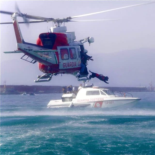 Rescue dog jumping from helicopter