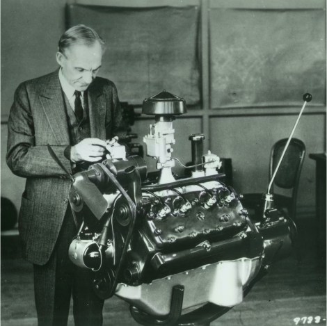 Henry Ford working on a V8 engine