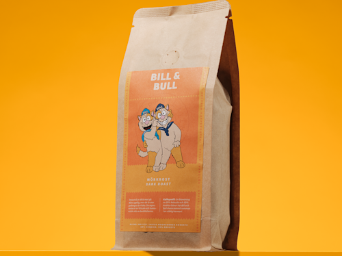 A brown bag of Bill & Bull mörkrost dark roast coffee with an illustrated label featuring two cartoon animals on an orange background.