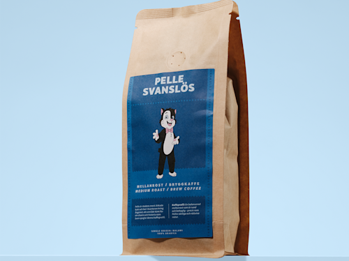 A brown coffee bag with a blue label featuring an illustrated cat in a suit, named "Pelle Svanslös," and text describing it as medium roast brew coffee.