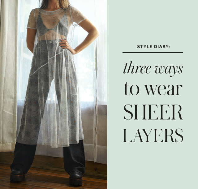 One way to wear a strappy silk slip dress. Layer a sheer top above