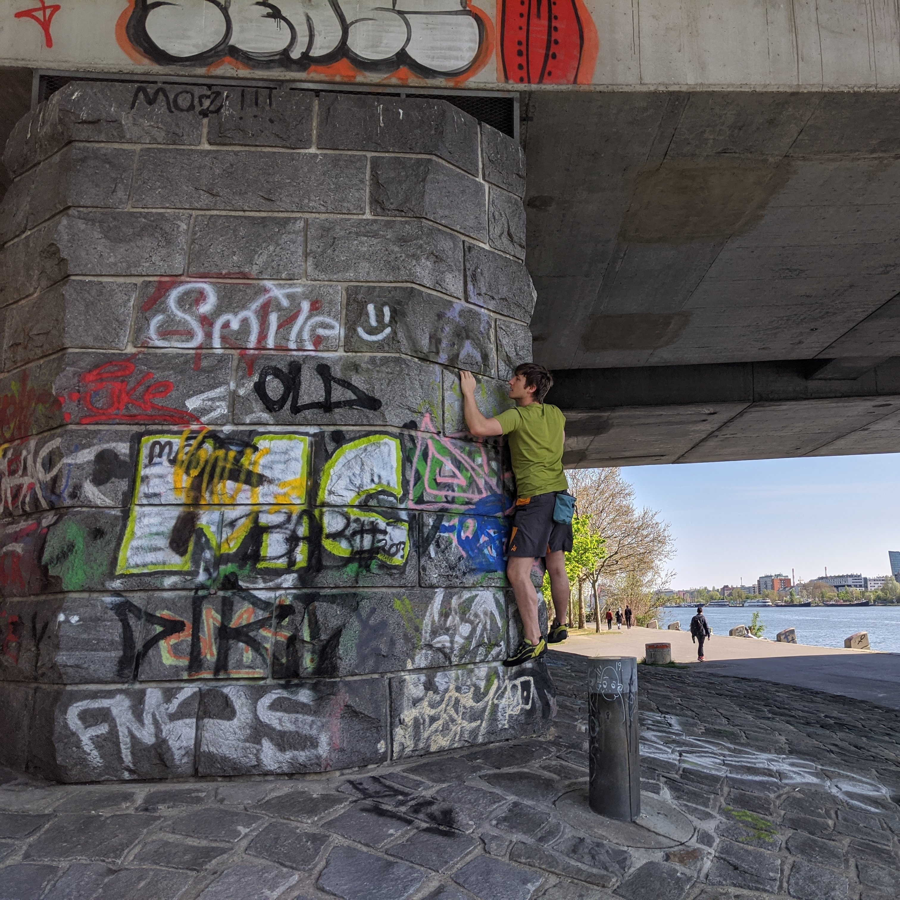 Me climbing on the bridge next to the Danube