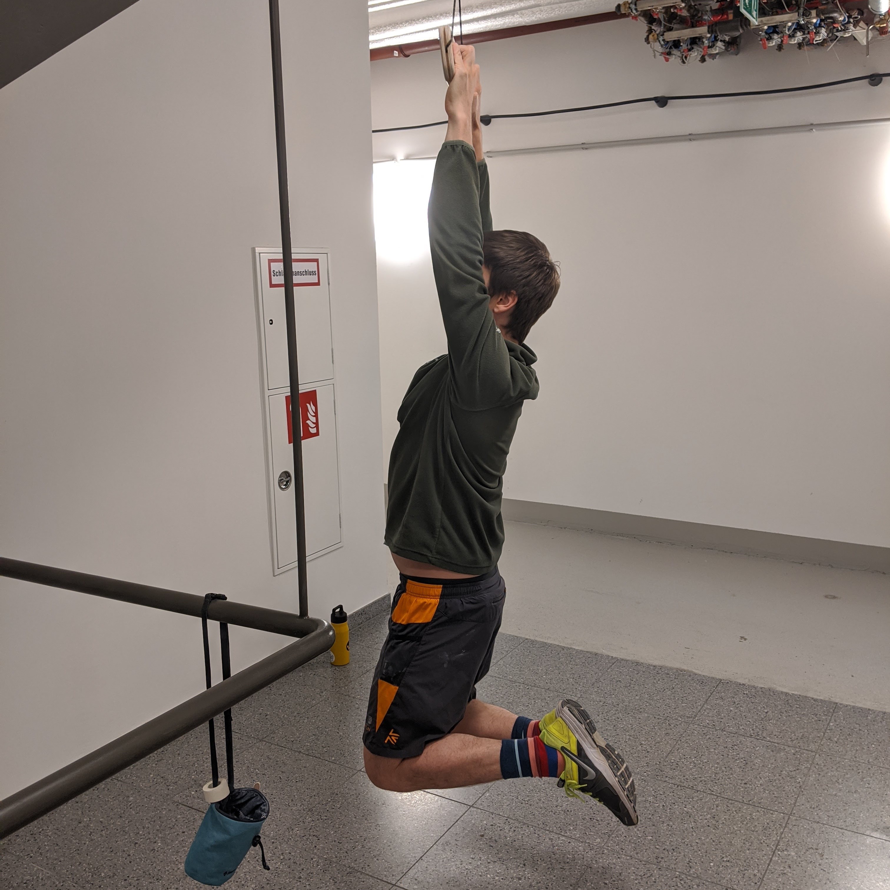 Me hanging off the fingerboard in the basement