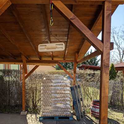 A Problemsolver fingerboard is hanging from the ceiling.