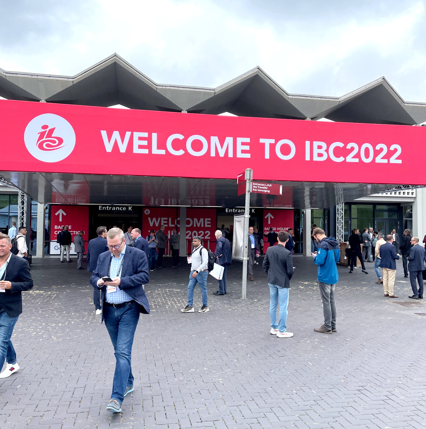 Photo of the entrance to the International Broadcasting Convention event, with a large banner that says "Welcome to IBC2022".