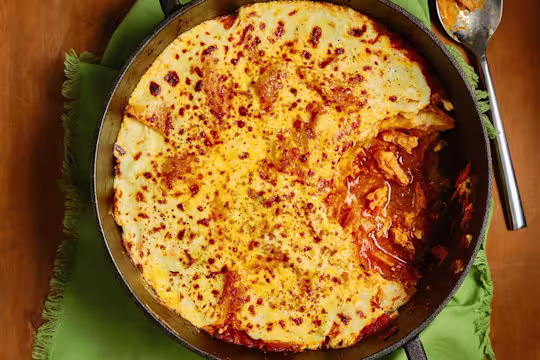 One Pan Quorn Vegetarian Chicken Lasagne with a small slice missing to show the filling.